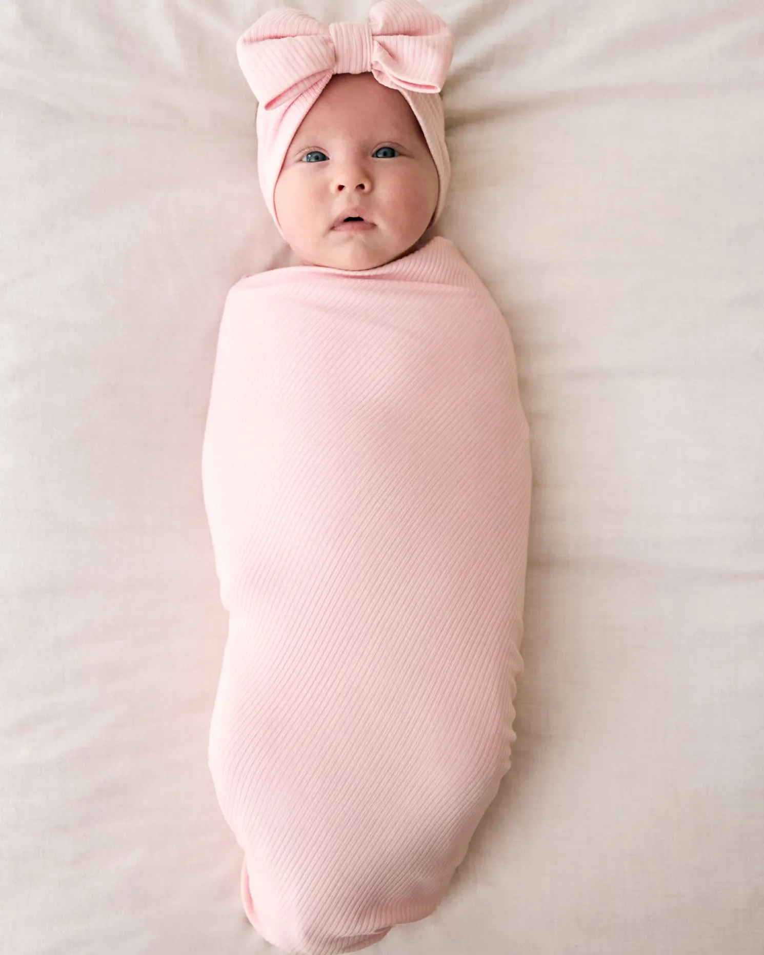 Prima Pink Ribbed Swaddle & Luxe Bow Headband Set