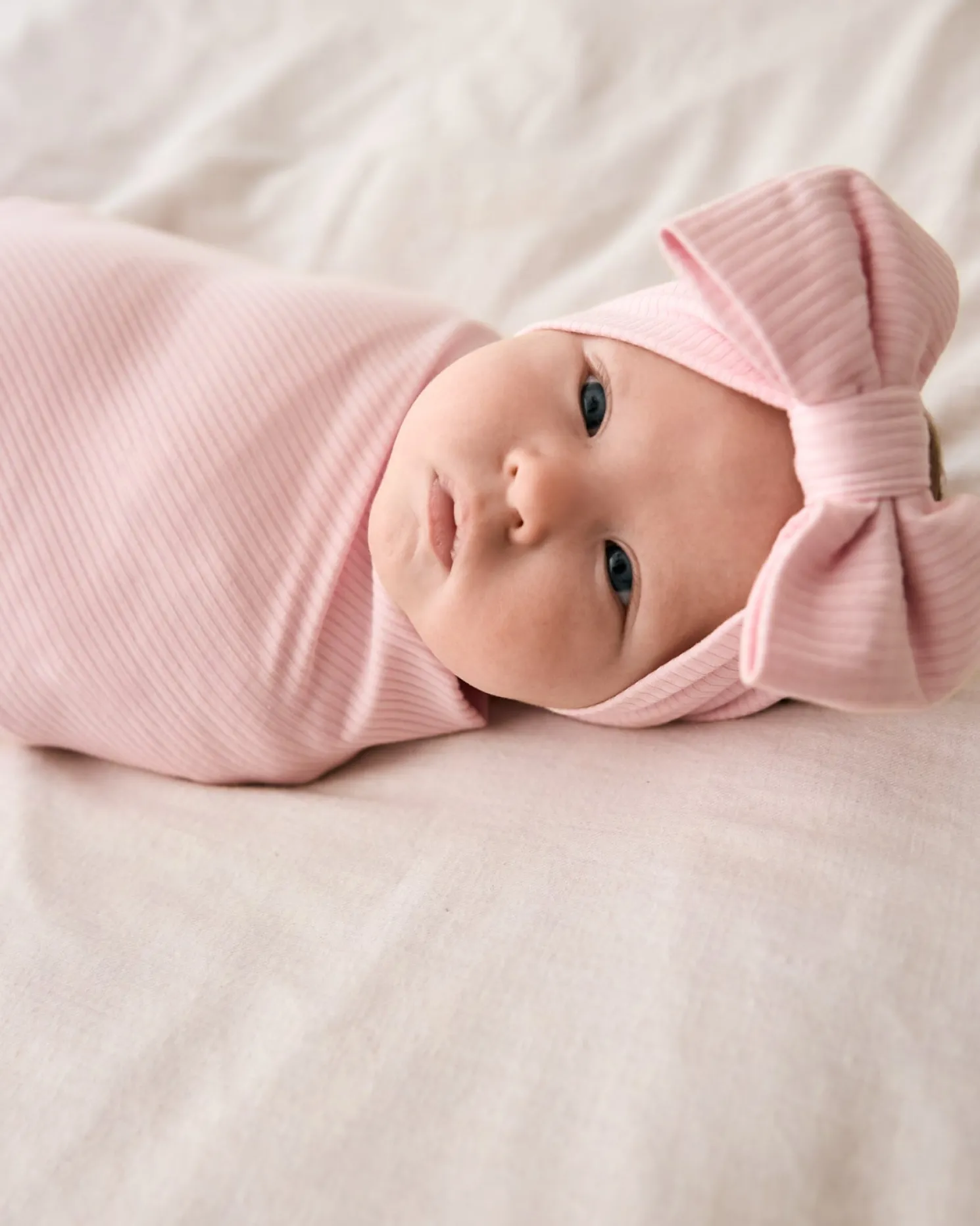 Prima Pink Ribbed Swaddle & Luxe Bow Headband Set