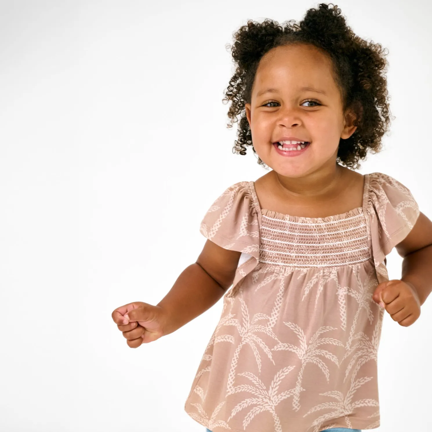 Sandy Palms Smocked Flutter Top